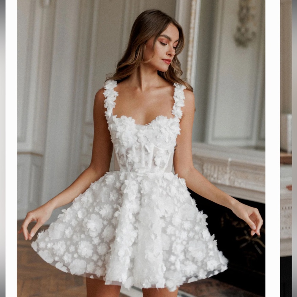 ROSIEETIENNE PRIMROSE dress US size 2. Stunning dress